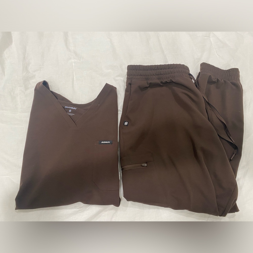 Barely worn. Like new. Color is brown. No rips. No stains.